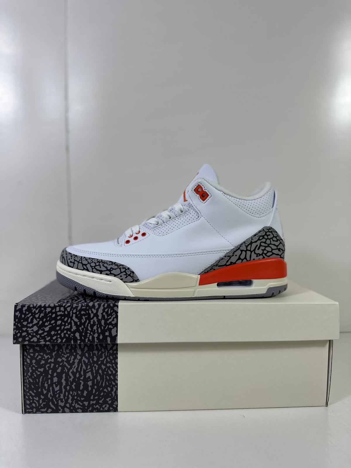 Air Jordan 3 Retro WMNS Georgia Peach Sneakers - product image from the listing.