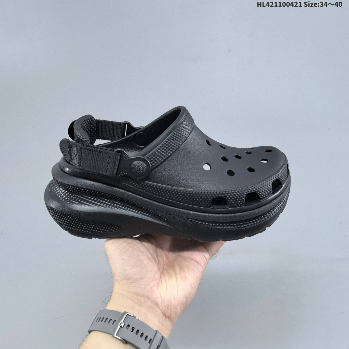 Platform Clogs with Vent Holes and Heel Straps by Crocs - product image from the listing.