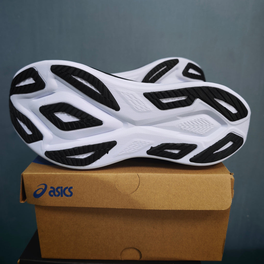 ASICS FF Leap Running Shoes in Black White 1013A177-100 - product image from the listing.