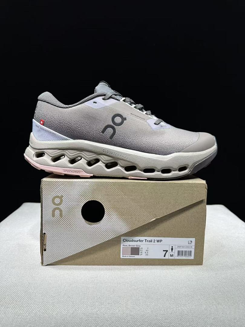 On Cloudsurfer Trail 2 Waterproof Trail Shoes Pink/Brown in Grey - product image from the listing.