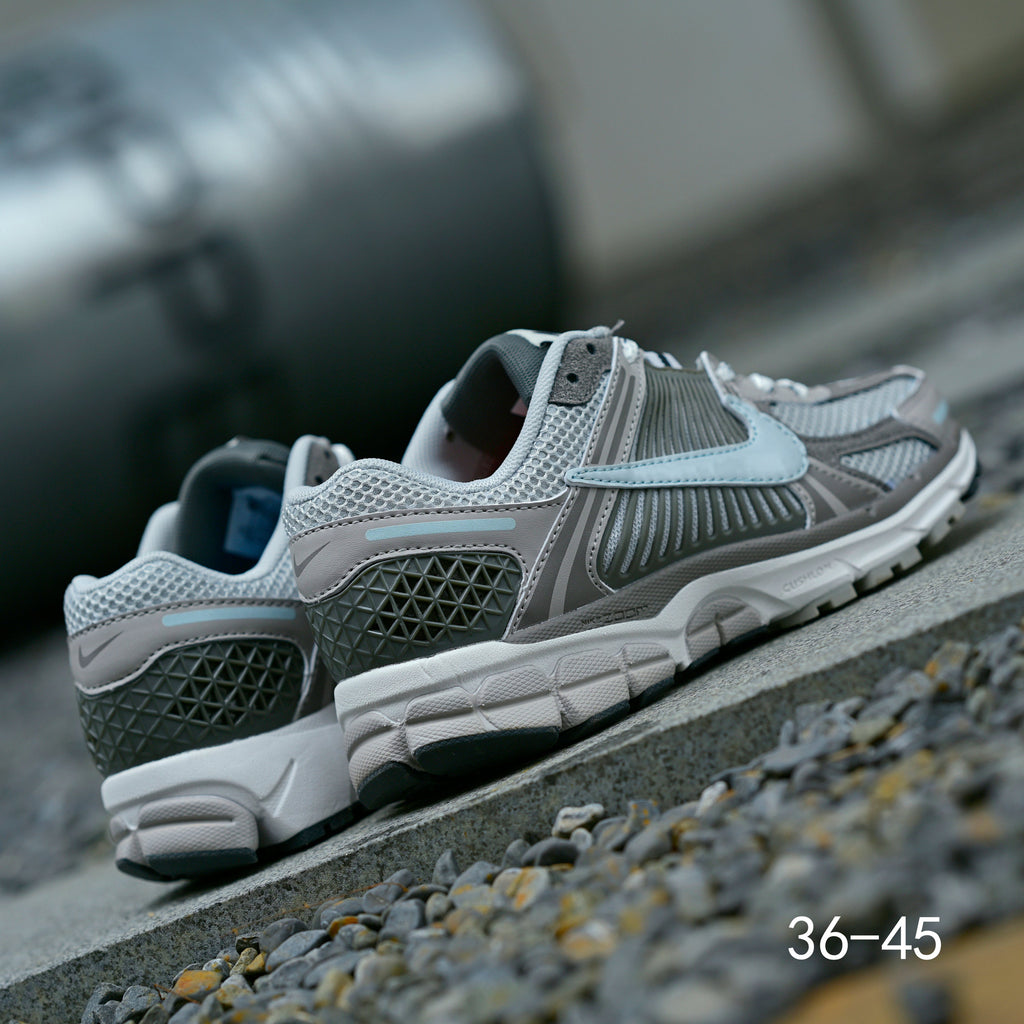 Grey Nike Air Zoom Vomero 5 Running Shoes - product image from the listing.