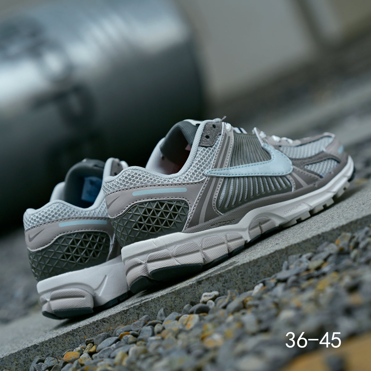 Grey Nike Air Zoom Vomero 5 Running Shoes - product image from the listing.
