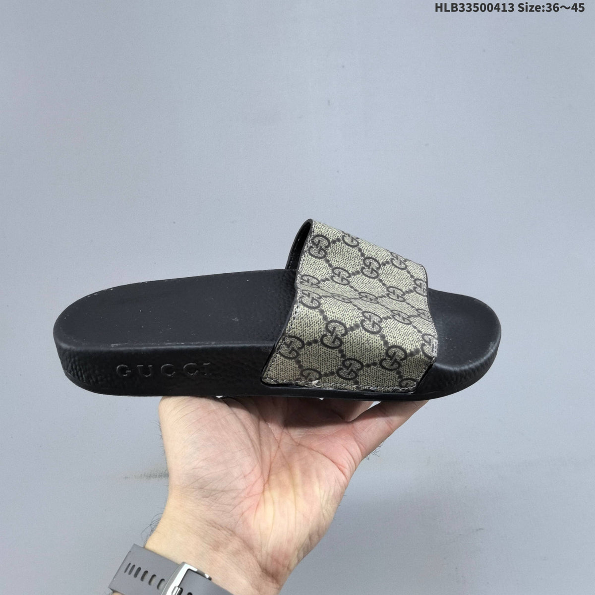 Floral Print Slide Sandals with Black Footbed by Gucci - product image from the listing.