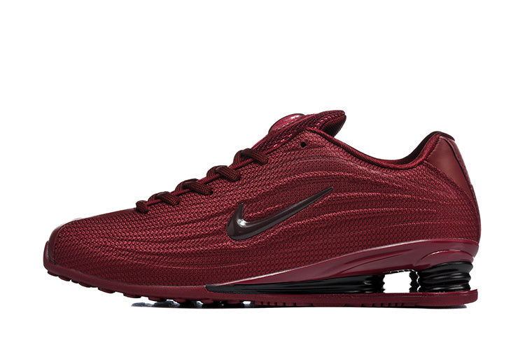 Nike Shox TL Low-Top Sneakers in Red - product image from the listing.