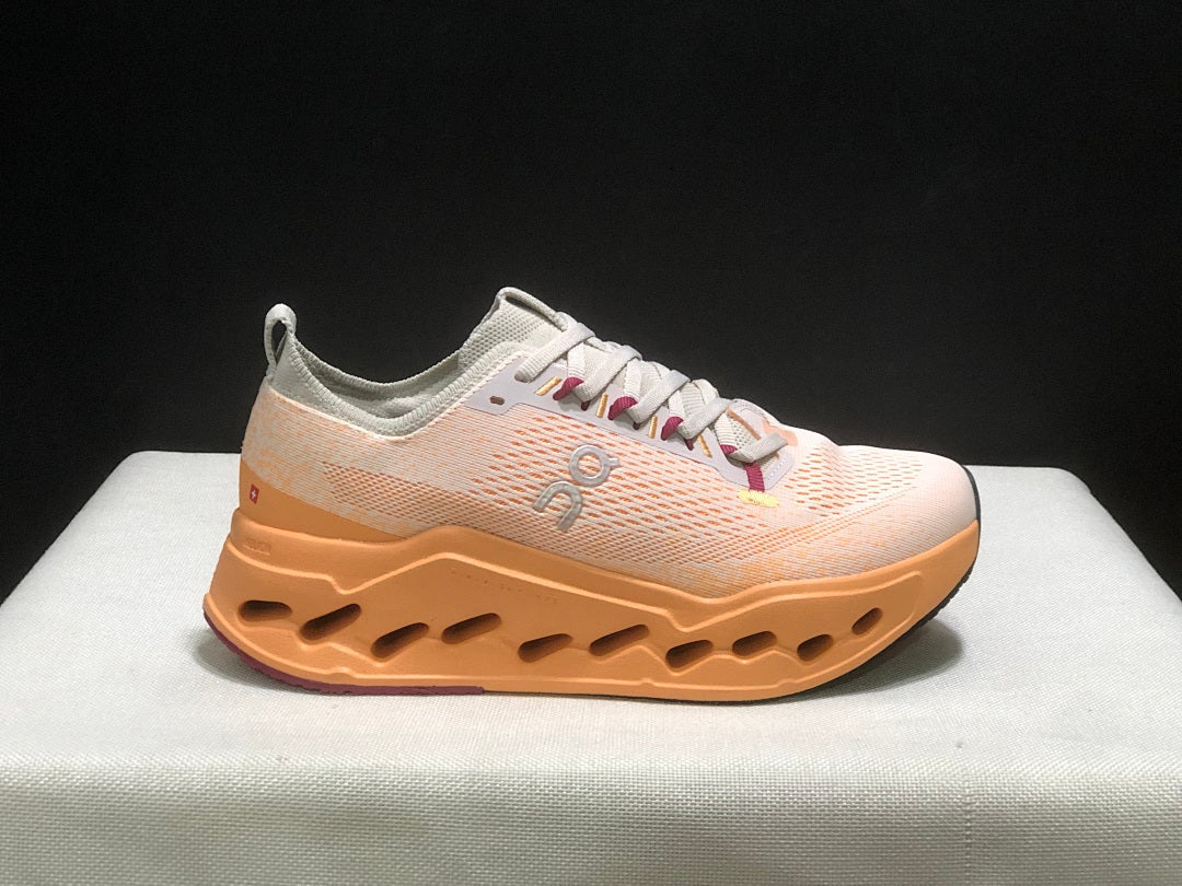 On Cloudsurfer Max Shoes for Running in Pearl and Tangerine - product image from the listing.