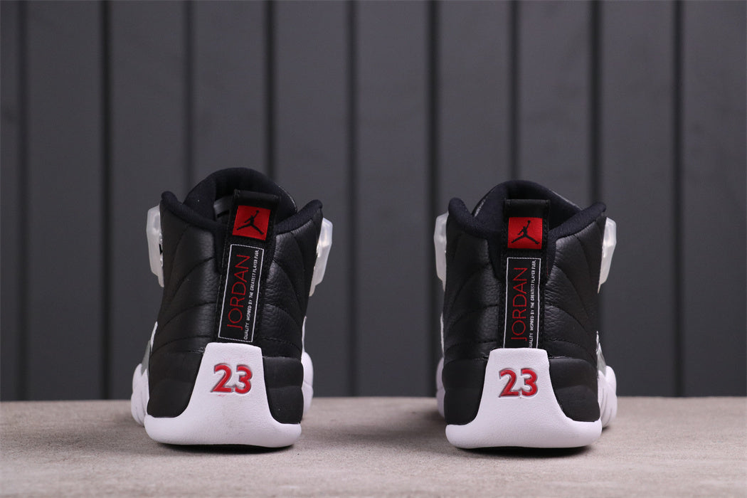 Air Jordan 12 Reverse Taxi Black White 130690-001 - product image from the listing.