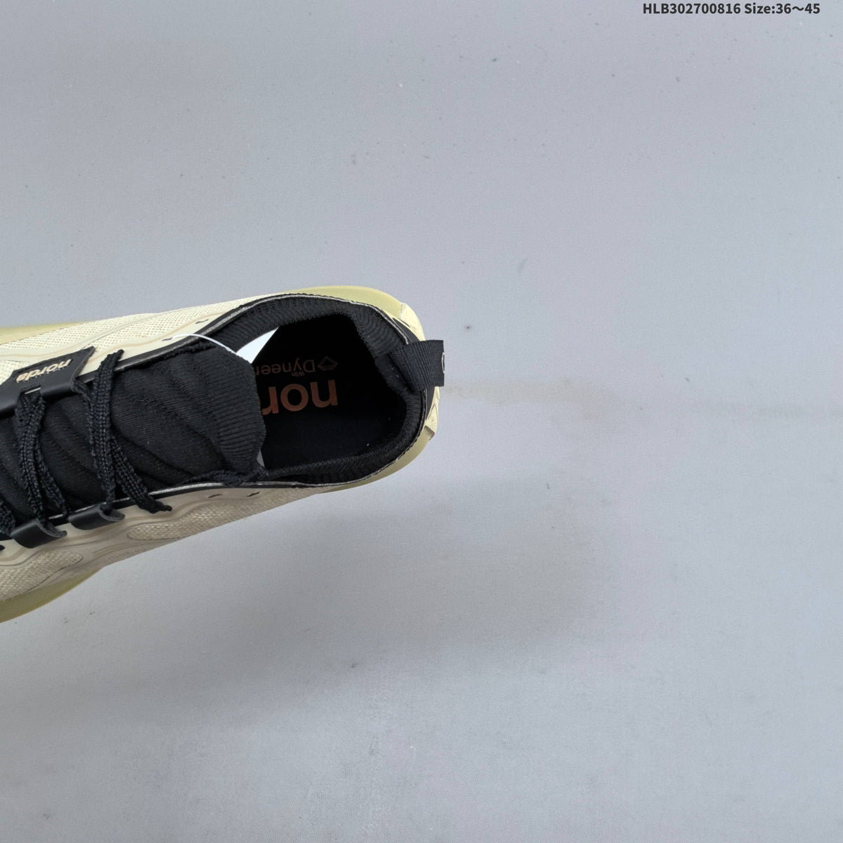 Cream and Black Norda 055 Trail Running Shoes - product image from the listing.