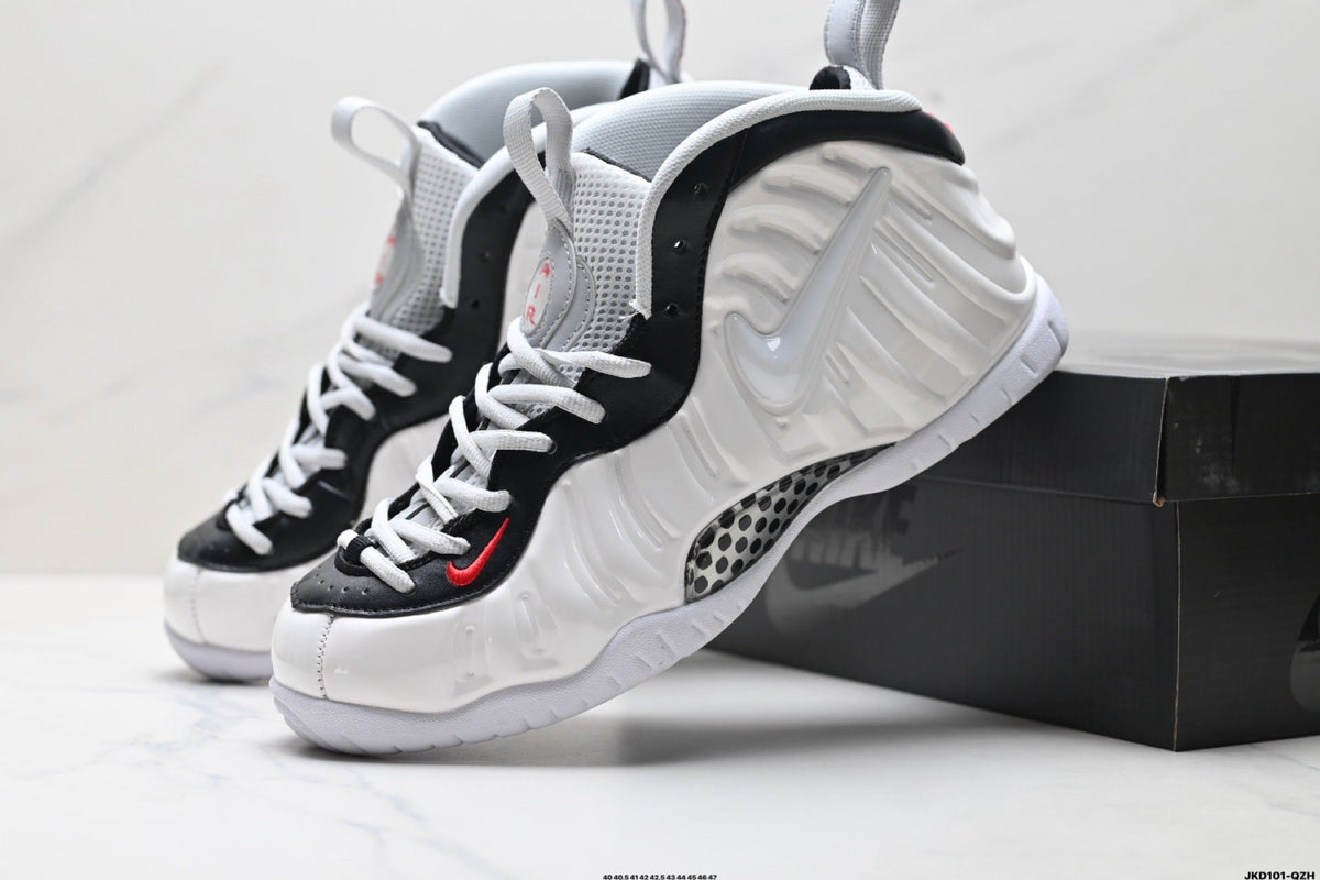 Nike Air More Uptempo Basketball Sneakers in White and Black - product image from the listing.
