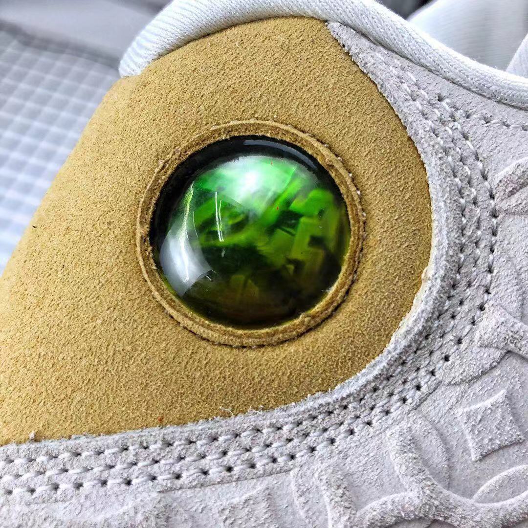 Air Jordan 13 CNY Sneakers in White, in Gold and Pink - product image from the listing.