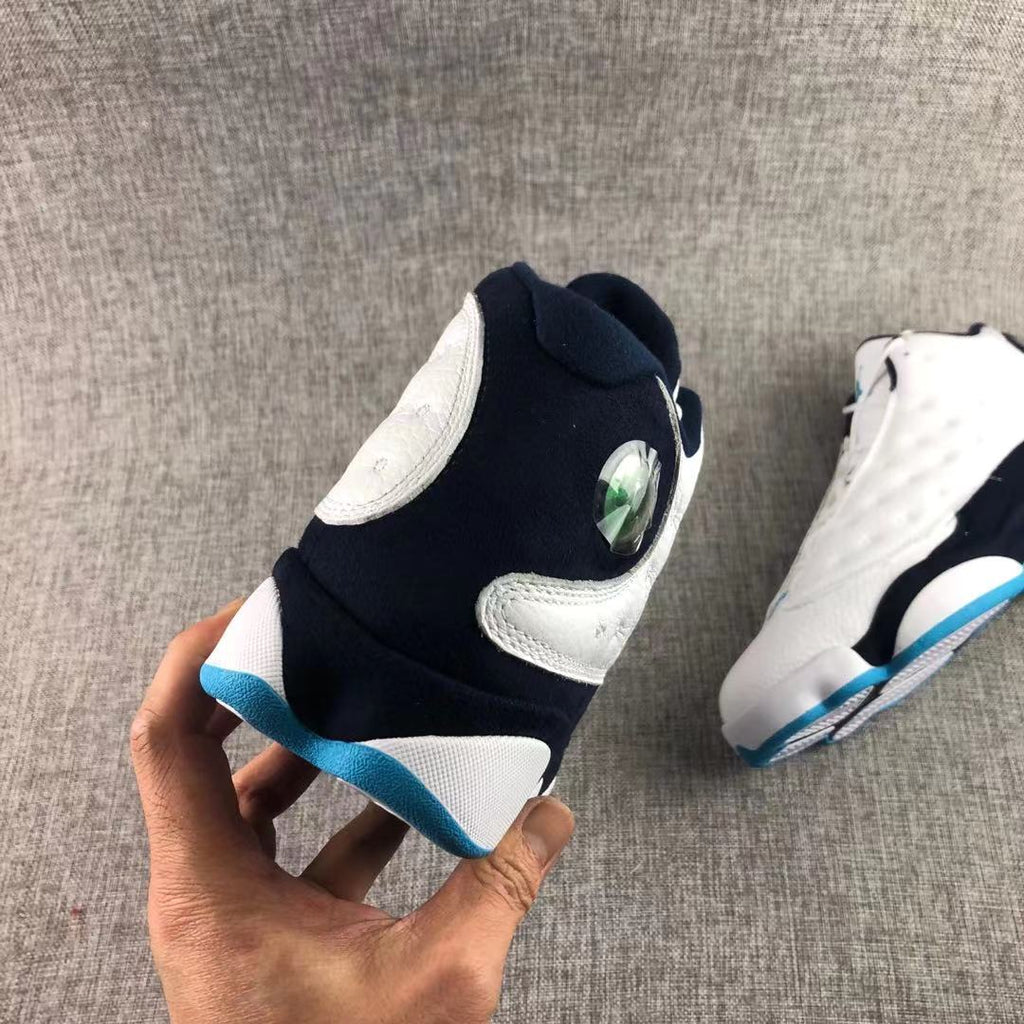 Air Jordan 13 Dark Powder Blue Sneakers White Navy - product image from the listing.