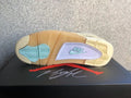Jordan 4 Retro Sneakers in Off-White Sail - product image from the listing.