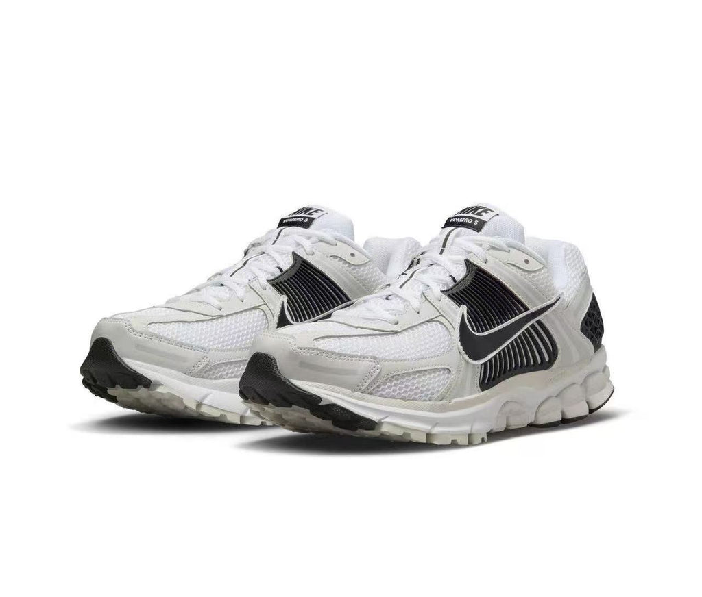 Nike Zoom Vomero 5 Sneakers in White and Black - product image from the listing.