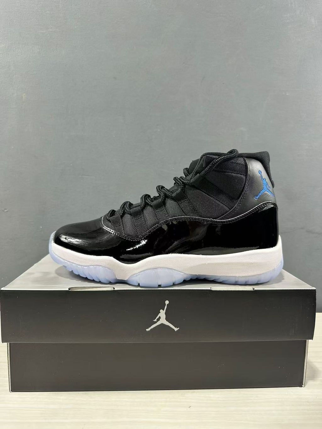 Air Jordan 11 Retro High Sneakers Black Blue CT8012-900 - product image from the listing.