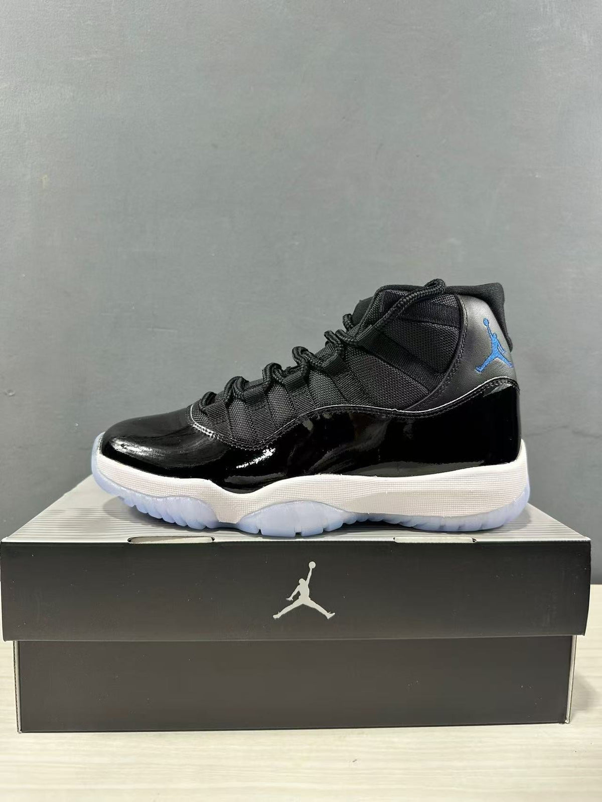 Air Jordan 11 Retro High Sneakers Black Blue CT8012-900 - product image from the listing.