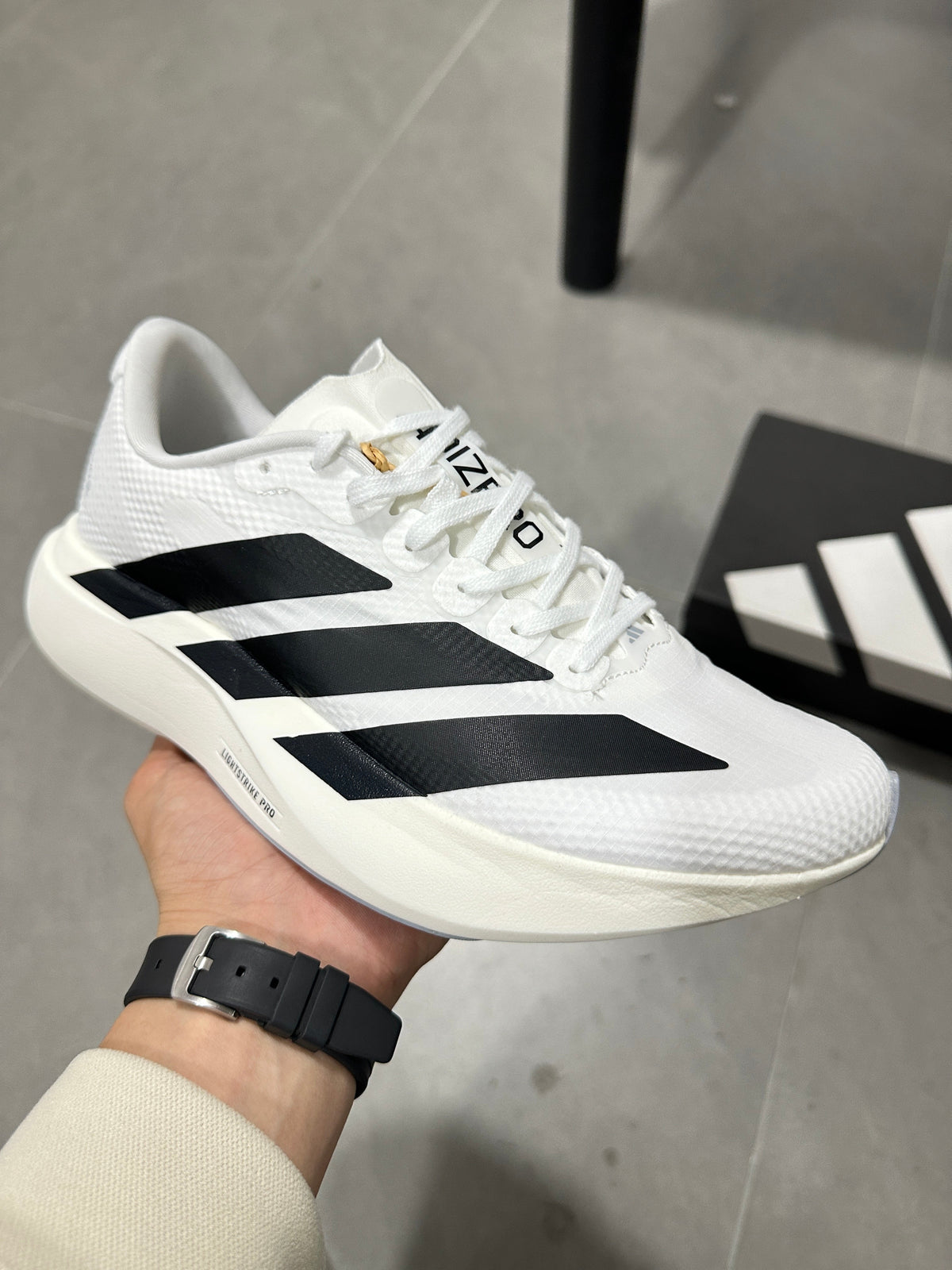adidas Adizero Lightstrike Pro Running Shoes in White JR4736 - product image from the listing.