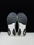 On Cloudboom Strike LS Running Shoes in White Black - product image from the listing.
