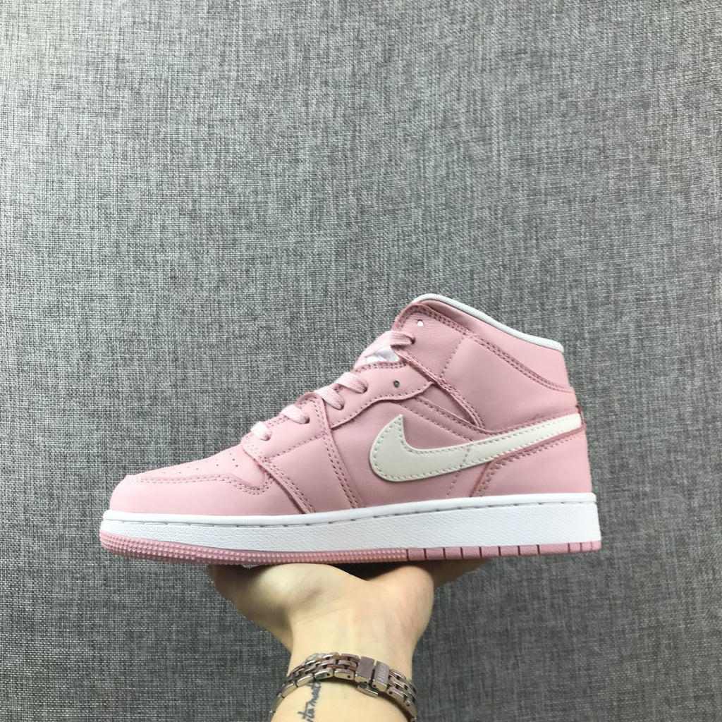 Women's Jordan 1 Mid Pink Sneakers 555112-100 - product image from the listing.
