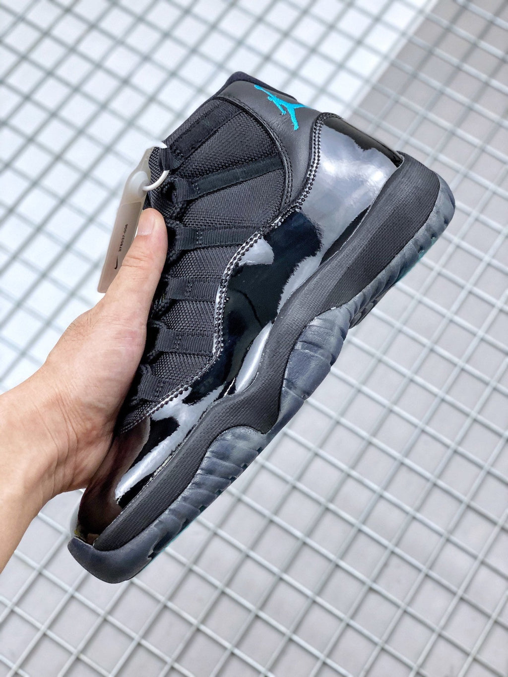 Air Jordan 11 Retro Gamma Black Sneakers 378037-006 - product image from the listing.