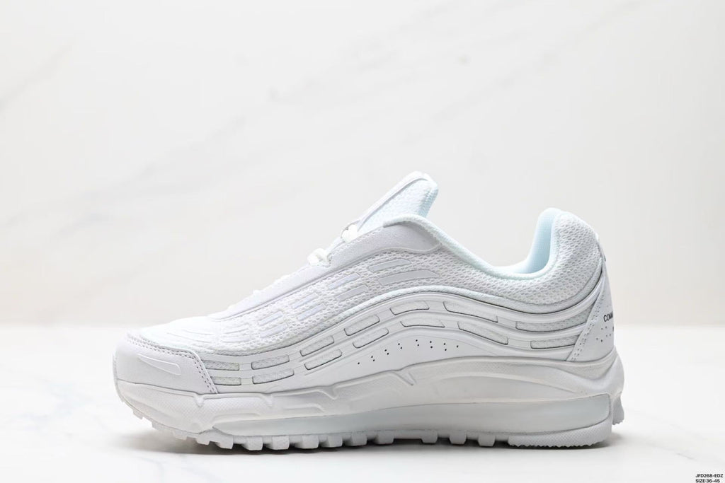 Nike Air Max Plus Comme des Garçons Sneakers in White - product image from the listing.