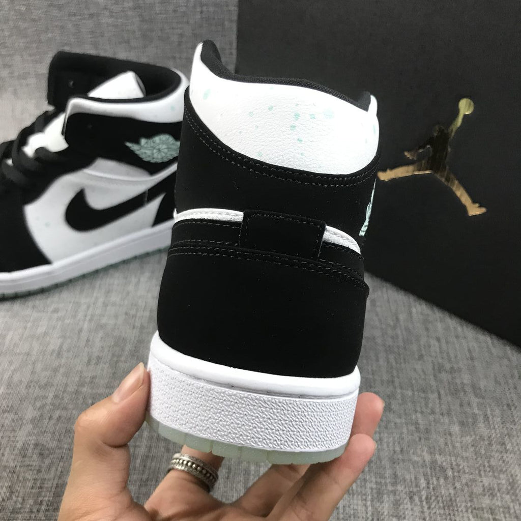 Air Jordan 1 Mid Sneakers in Black White Mint BQ6931-103 - product image from the listing.