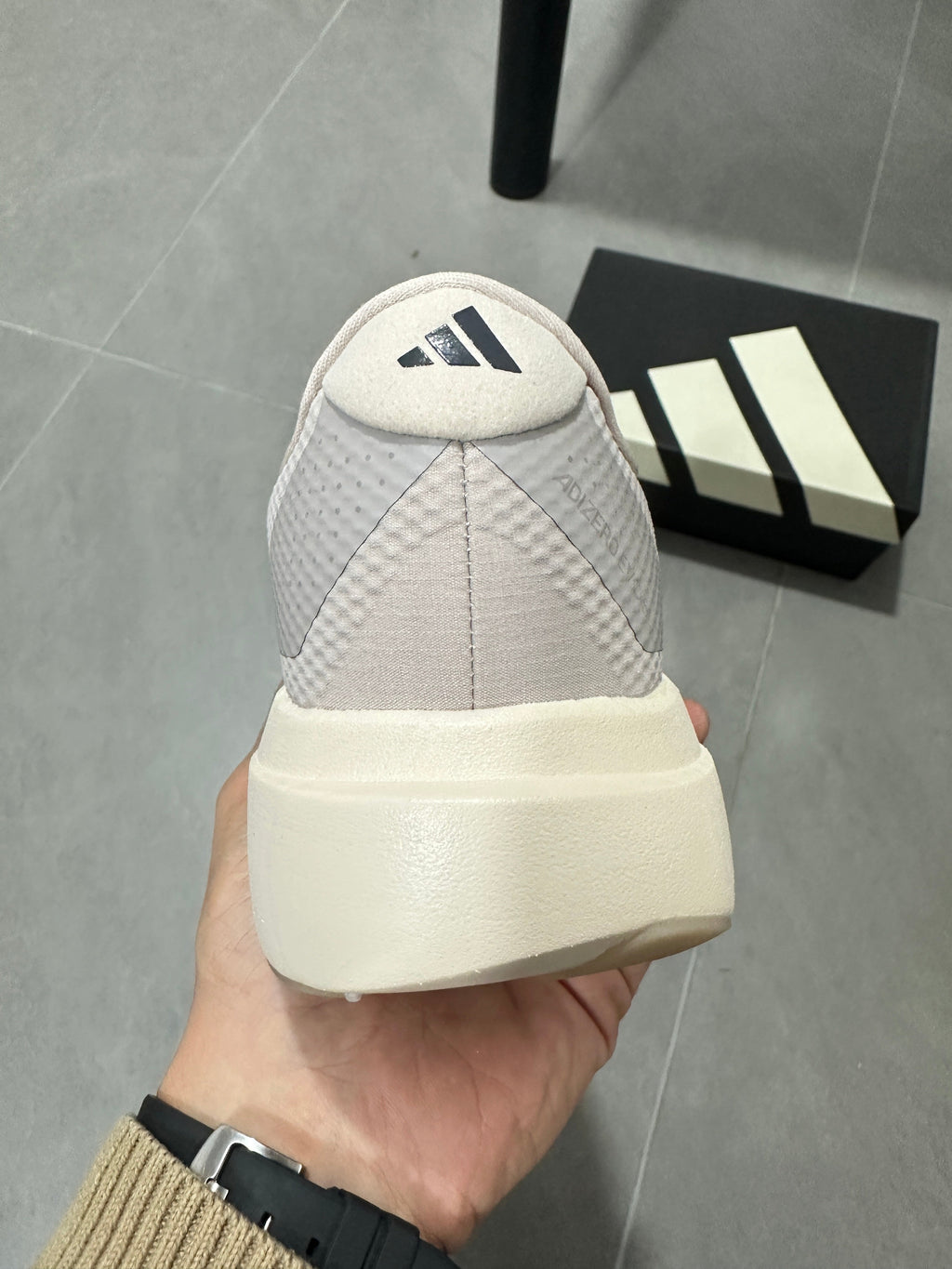 Adidas Lightstrike Pro Running Shoes in White and Gray KJ2001 - product image from the listing.