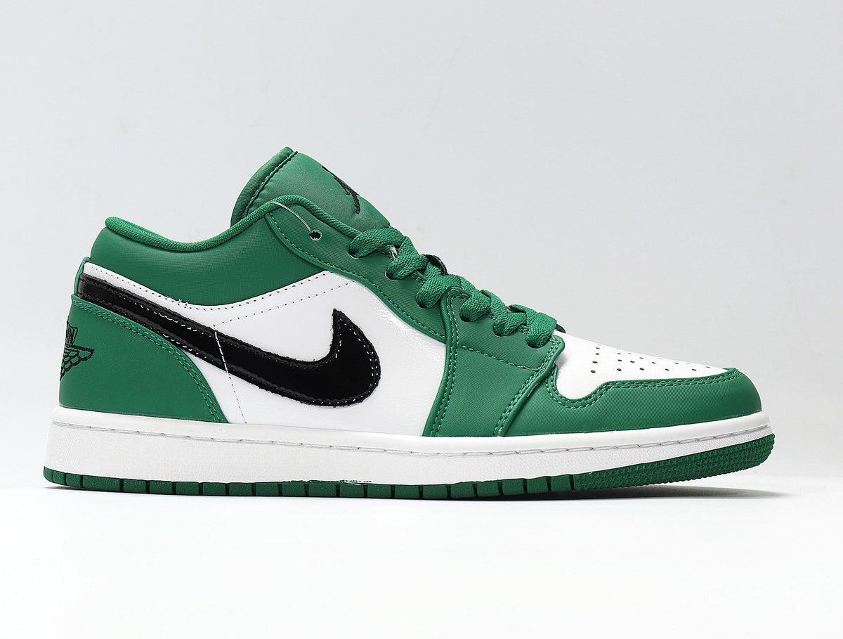 Jordan 1 Low Sneakers in White and Green 553558-301 - product image from the listing.