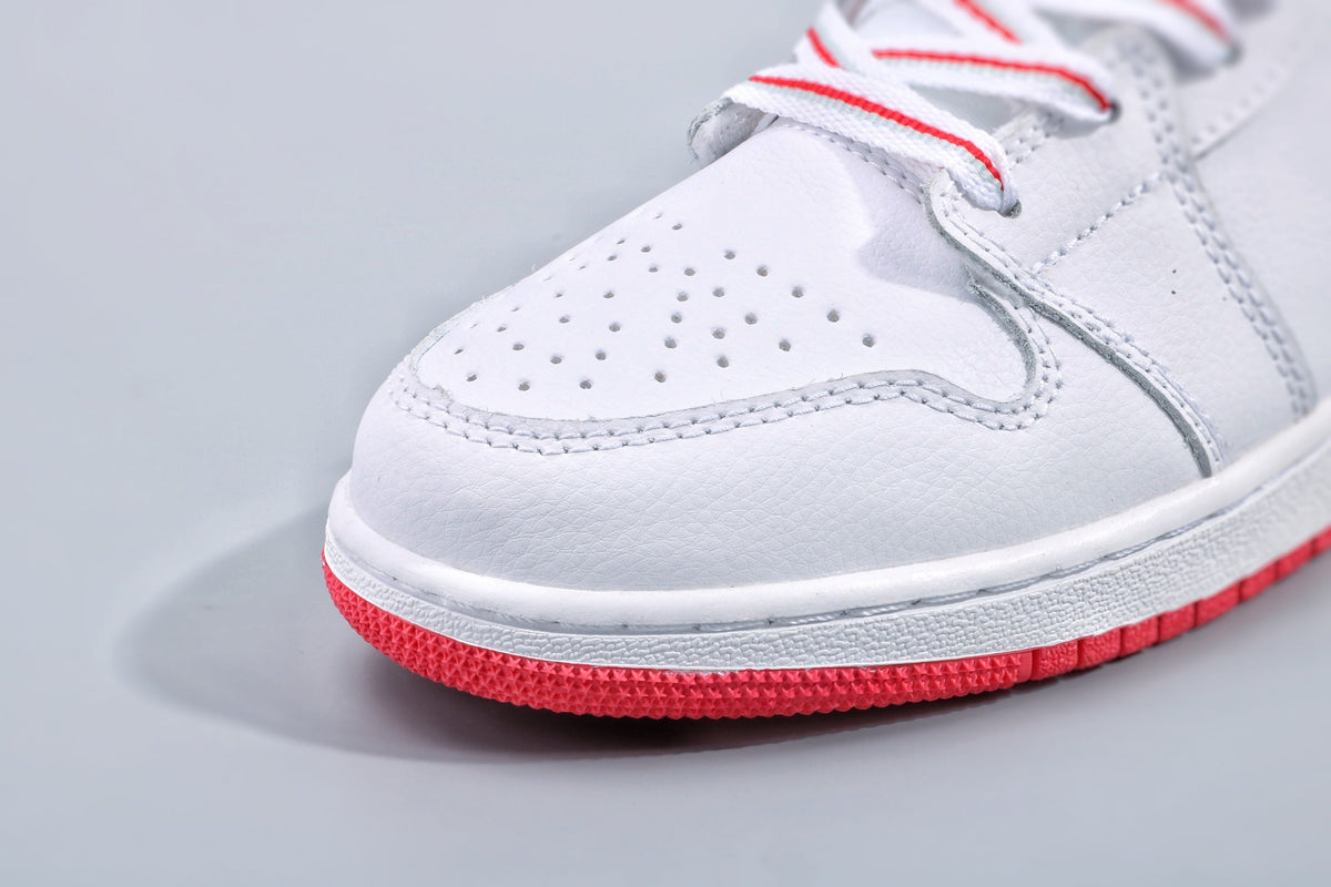 Women's Nike Air Jordan 1 Low White and Pink Sneakers - product image from the listing.