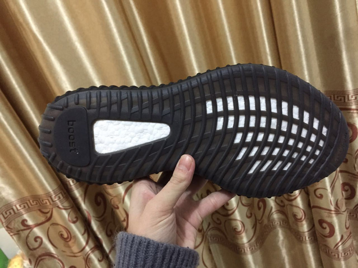 Black and Beige Yeezy 350 V2 Knit Sneakers - product image from the listing.