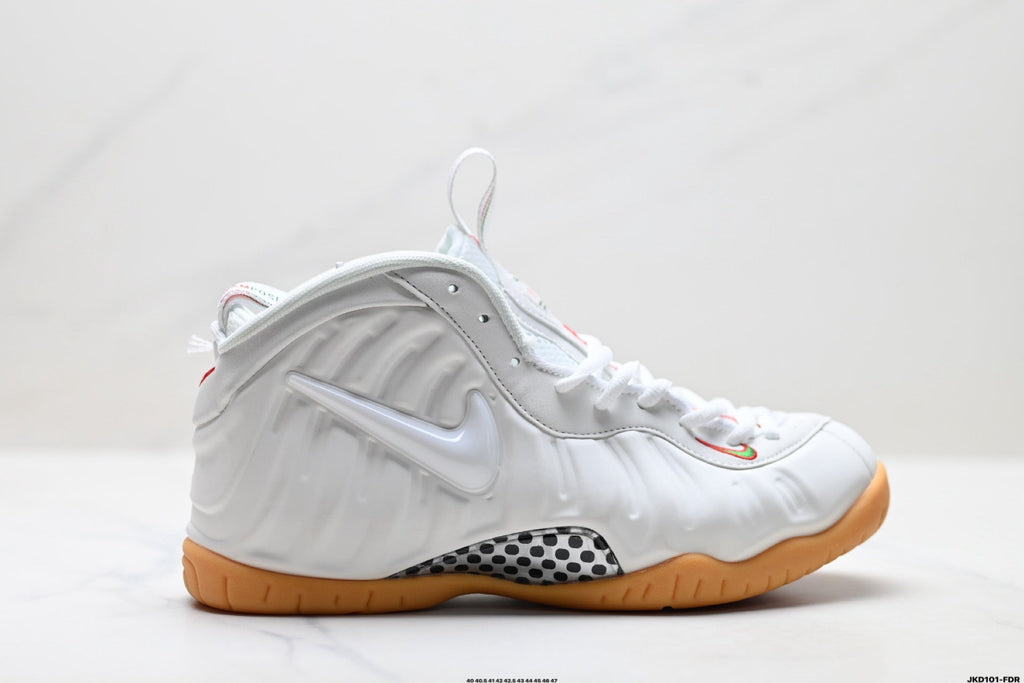 Nike Air Penny Foamposite Sneakers in White and Gum - product image from the listing.
