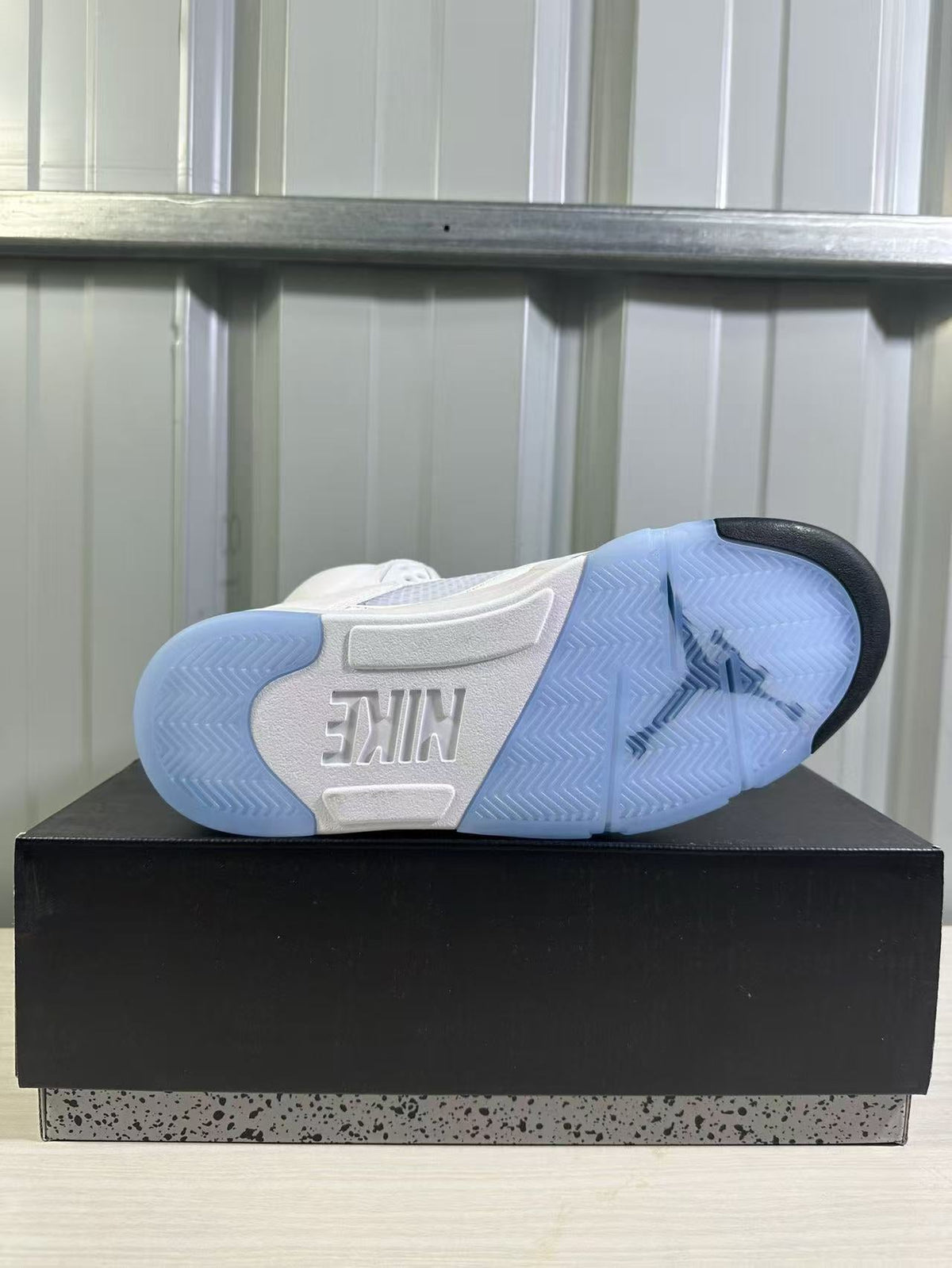 Air Jordan 5 Sneakers in White Silver HQ7978-103 - product image from the listing.