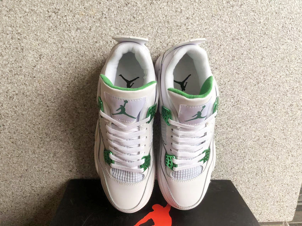 Jordan 4 Sneakers in White and Green - product image from the listing.