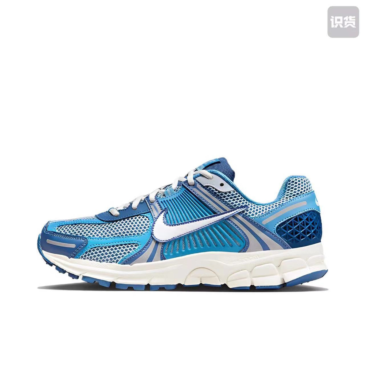 Nike Zoom Vomero 5 Sneakers in White Blue Silver - product image from the listing.