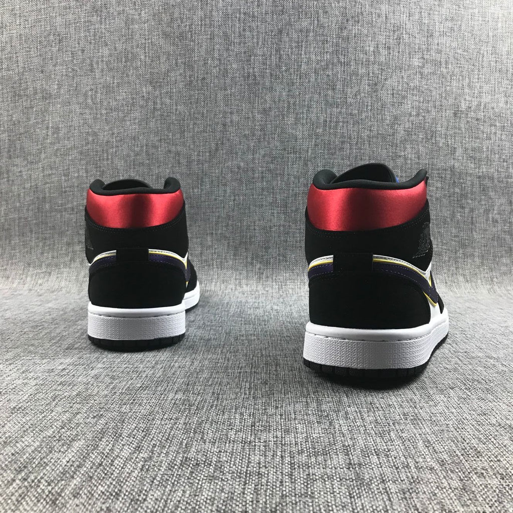 Air Jordan 1 Mid SE Sneakers in Black Purple Yellow 852542-005 - product image from the listing.