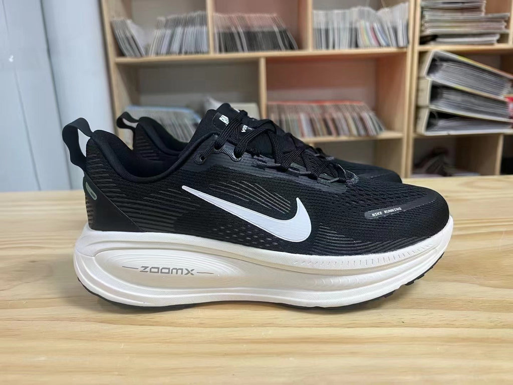 Nike Vomero 18 Running Shoes in Black and White - product image from the listing.