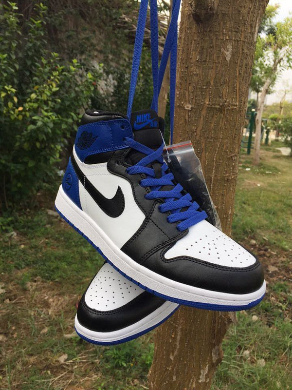 Jordan 1 High Sneakers in Black, in White and Royal Blue - product image from the listing.
