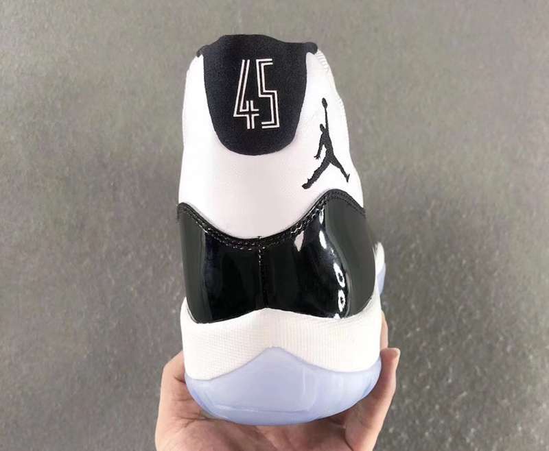 Air Jordan 11 Concord Black White Sneakers - product image from the listing.