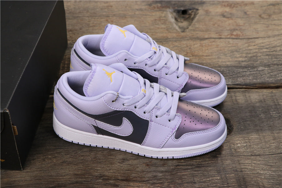 Air Jordan 1 Low GS Oxygen Sneakers in Purple 554723-505 - product image from the listing.