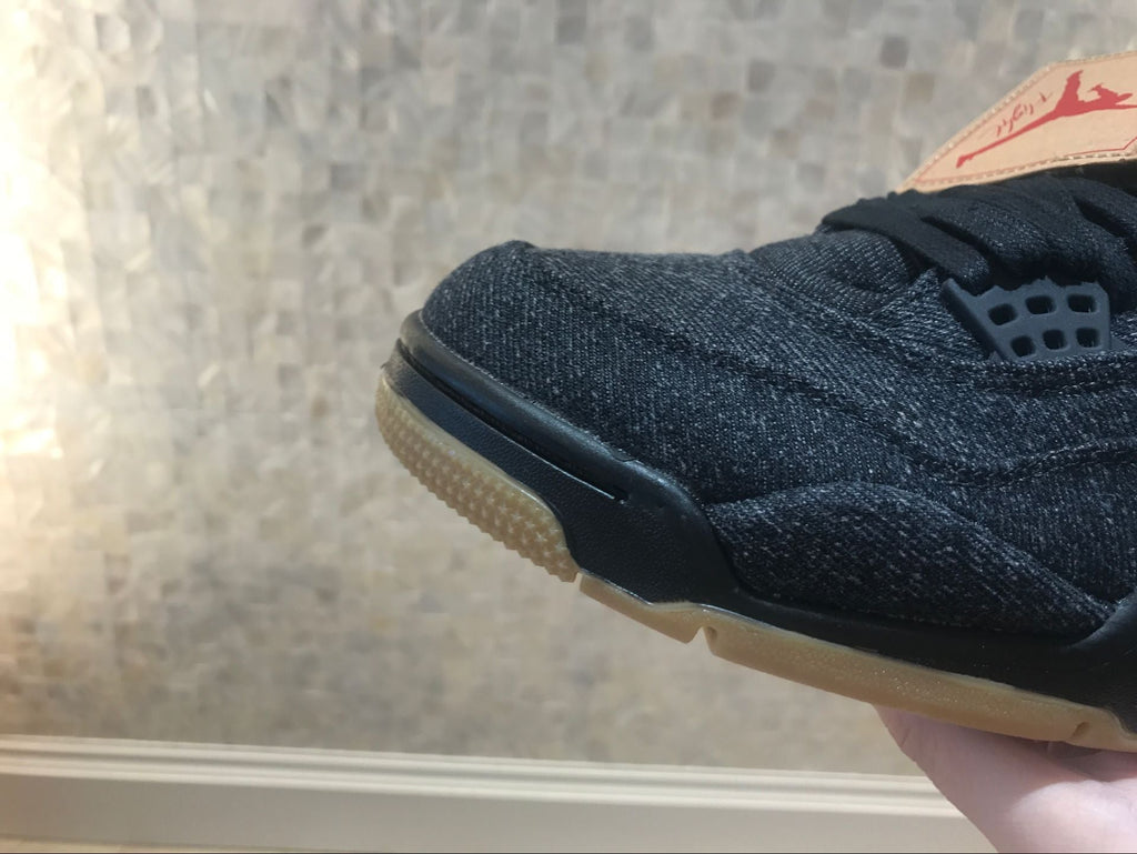 Jordan 4 Retro Levi's Sneakers in Black Denim A02571-001 - product image from the listing.