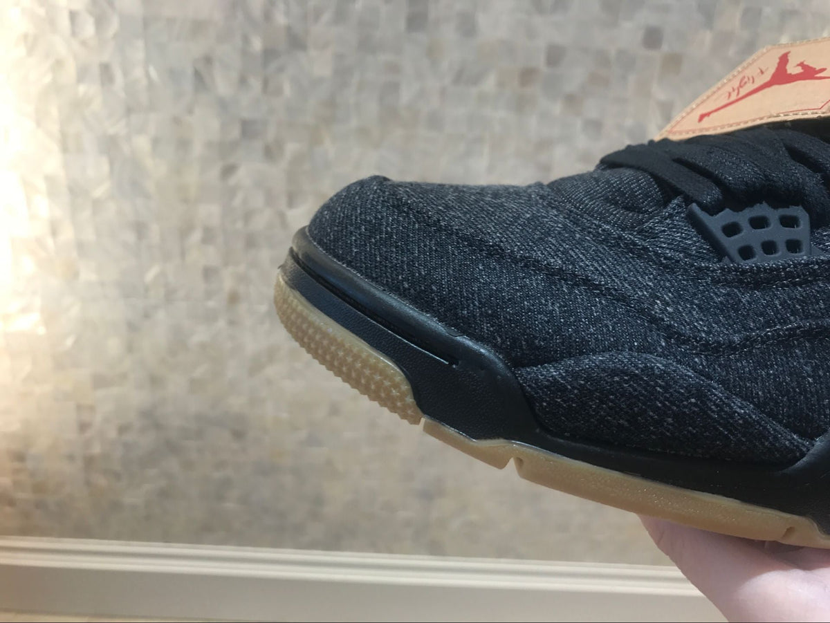 Jordan 4 Retro Levi's Sneakers in Black Denim A02571-001 - product image from the listing.