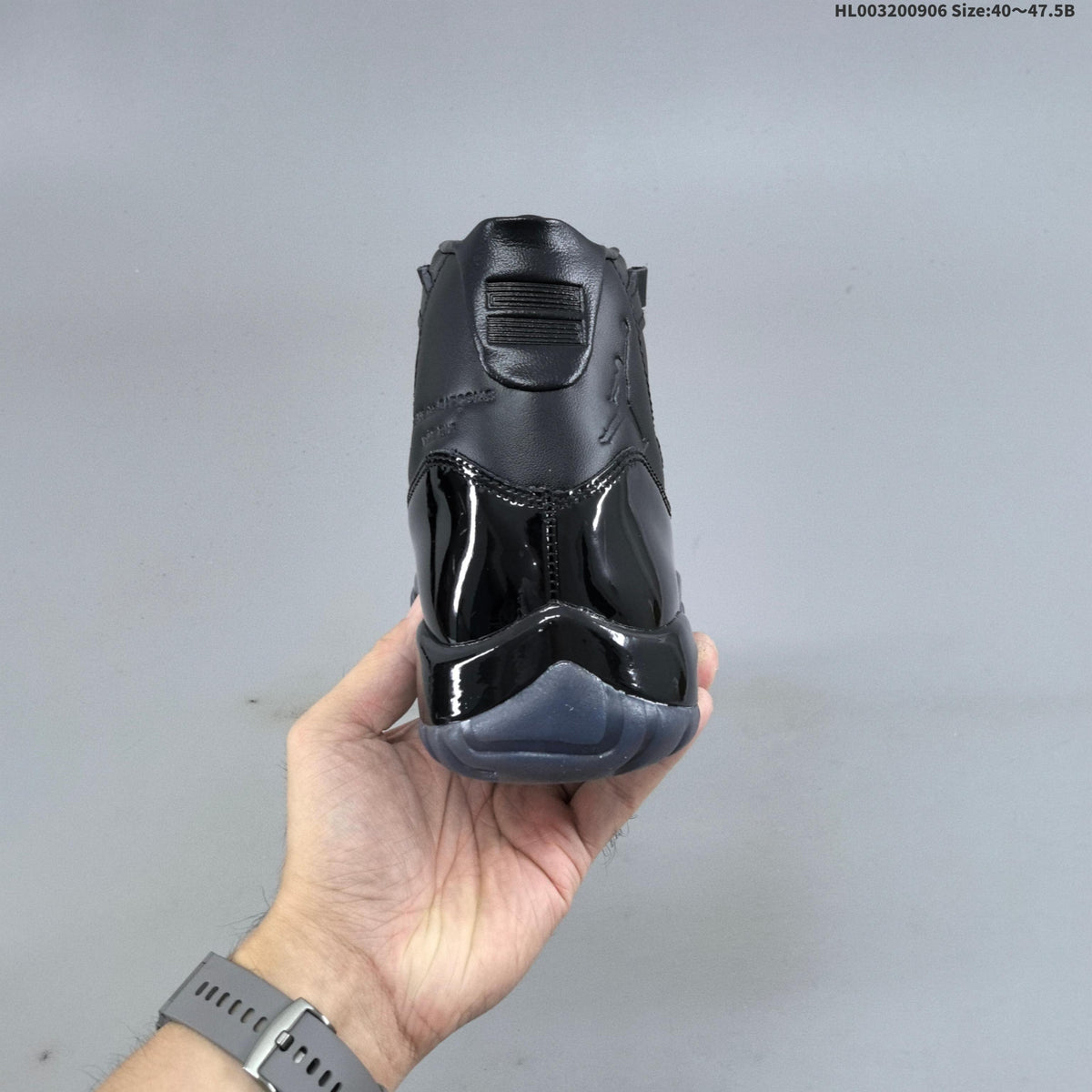 Air Jordan 11 High CDG Black Sneakers - product image from the listing.