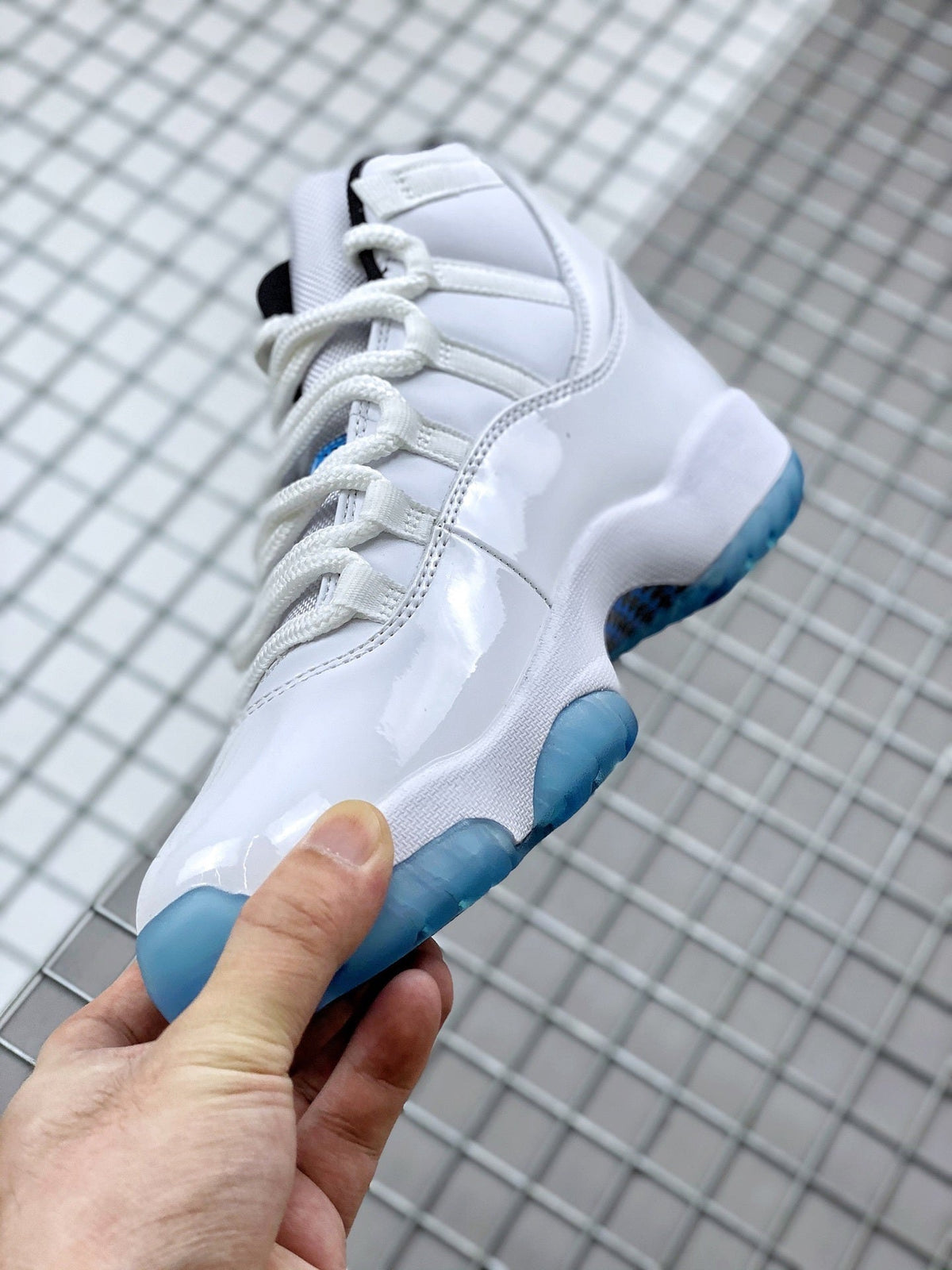 Jordan 11 Legend Blue Sneakers in White Blue 378037-117 - product image from the listing.