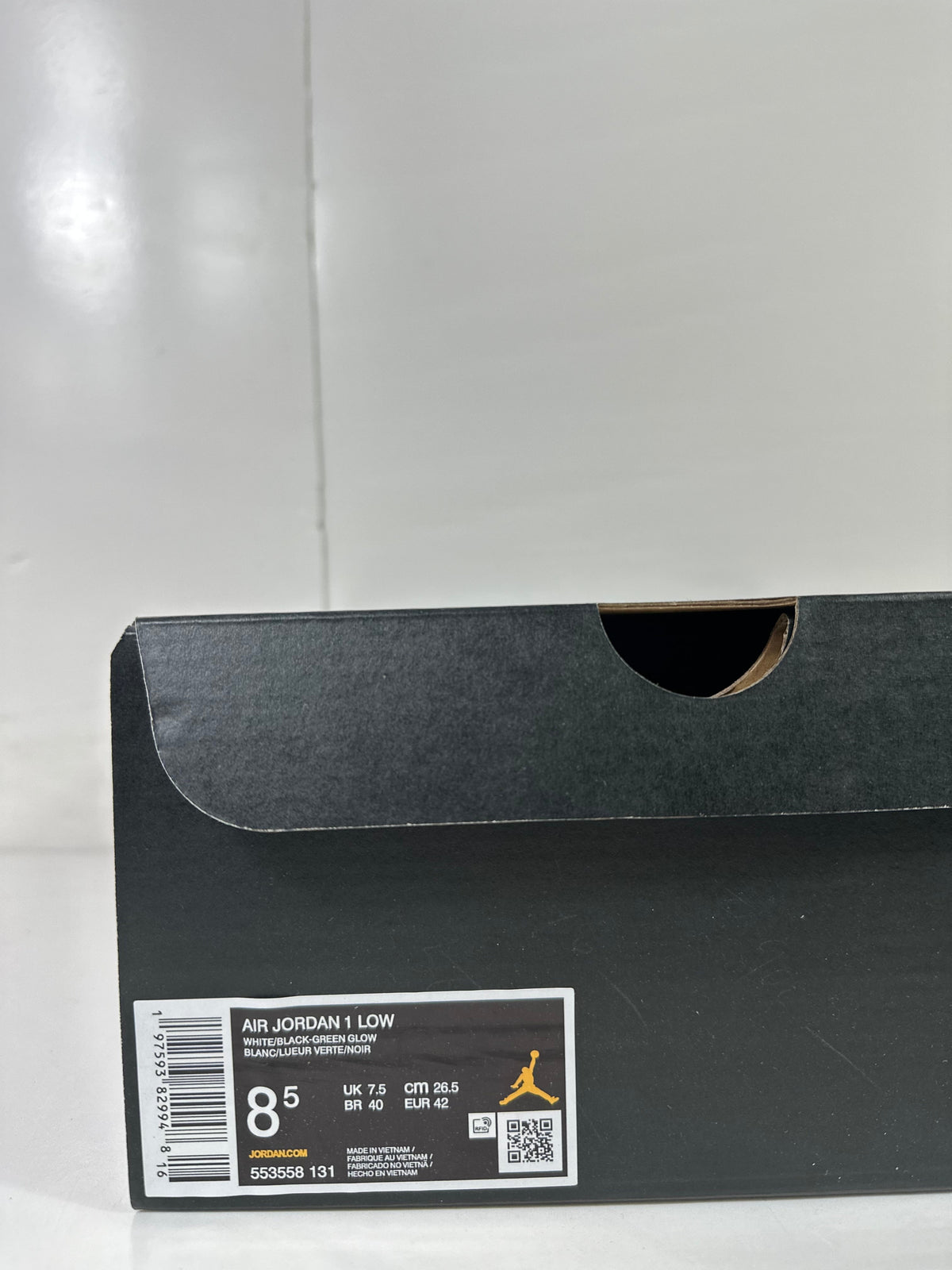 Air Jordan 1 Low White Green Black Sneakers 553558-131 - product image from the listing.