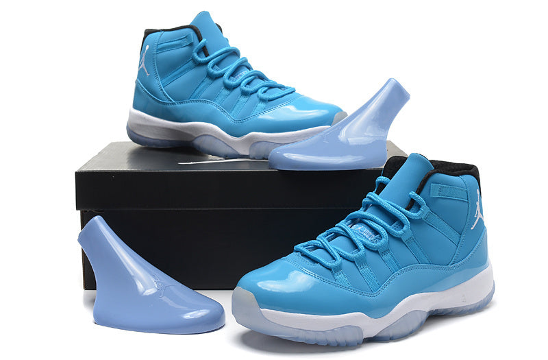 Blue and White Air Jordan 11 High Sneakers - product image from the listing.