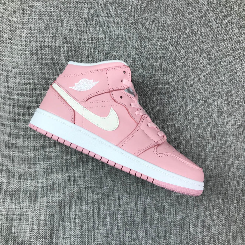 Women's Jordan 1 Mid Pink Sneakers 555112-100 - product image from the listing.