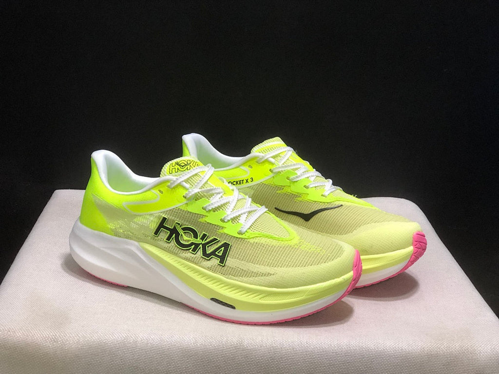 HOKA Rocket X 3 Running Shoes in Neon in Yellow and Pink - product image from the listing.