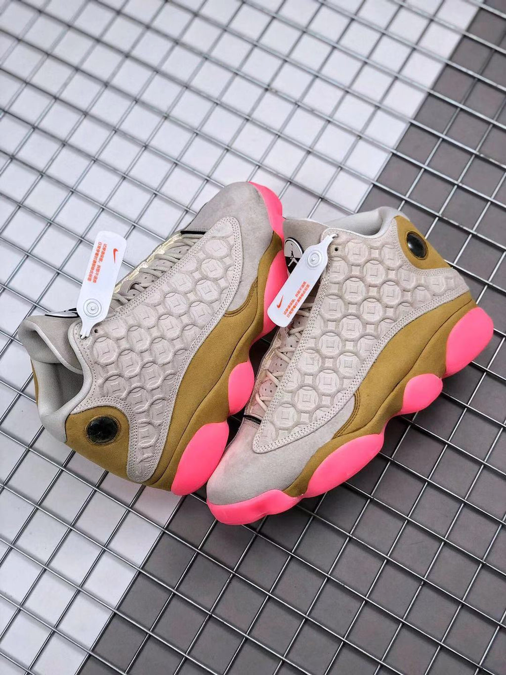 Air Jordan 13 CNY Sneakers in White, in Gold and Pink - product image from the listing.