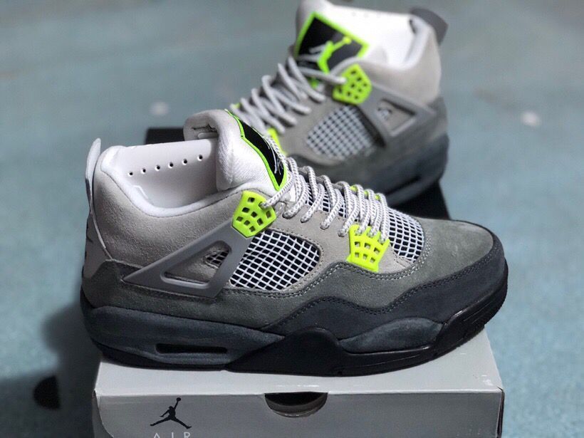 Jordan 4 Retro Sneakers in Gray Green - product image from the listing.