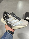 adidas Adizero Adios Pro 4 Running Shoes in White Black - product image from the listing.