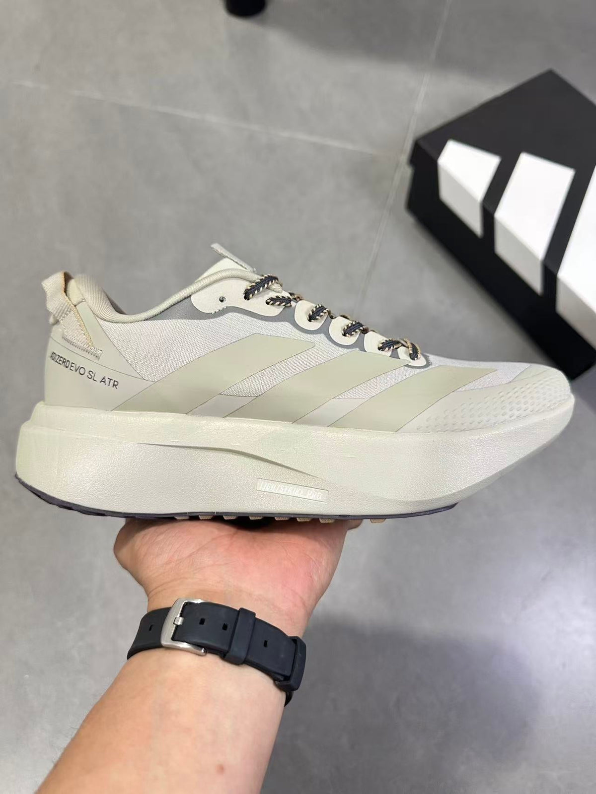 Adizero EVO SL ATR Running Shoes, in Light Brown - product image from the listing.