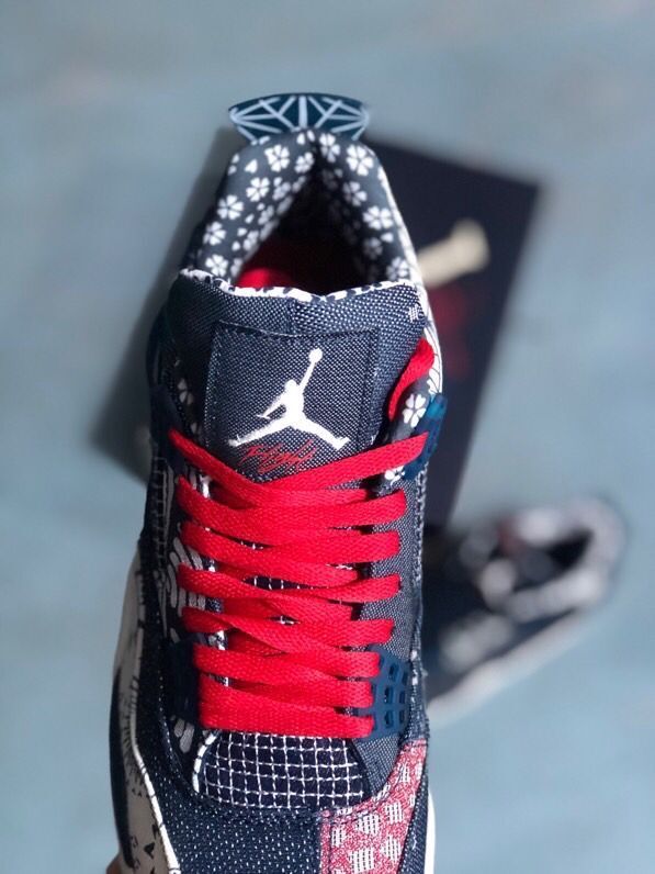 Jordan 4 Sashiko-Style Embroidered Sneakers in Navy - product image from the listing.
